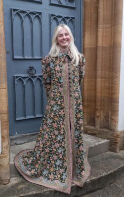 A vintage embroidered ladies coat, decorated flowers