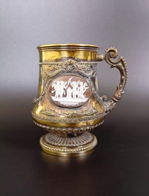 An unusual Victorian silver mug, inset with two cameos